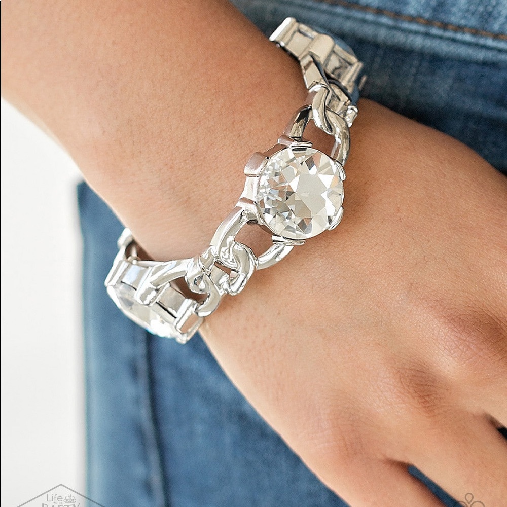 NWT Silvertone bracelet with rhinestones.